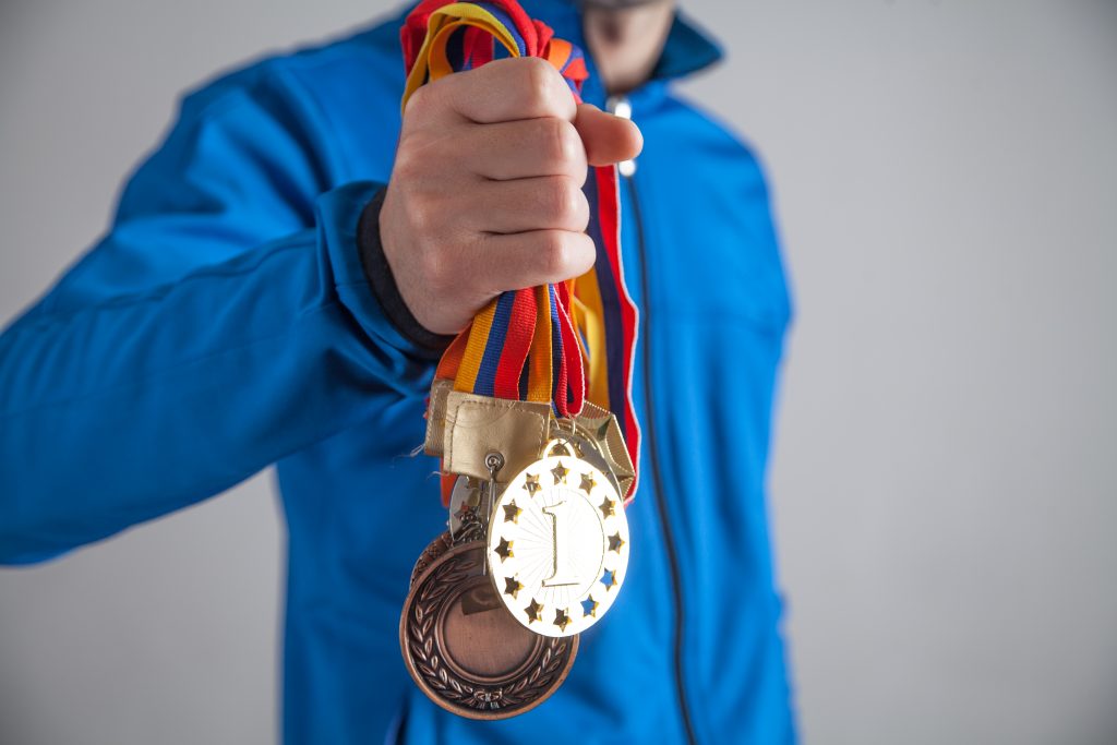 Sportsman with medals.