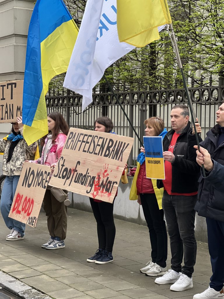 Promote Ukraine Demonstrates in Front of  Raiffeisen Bank Headquarters in Belgium